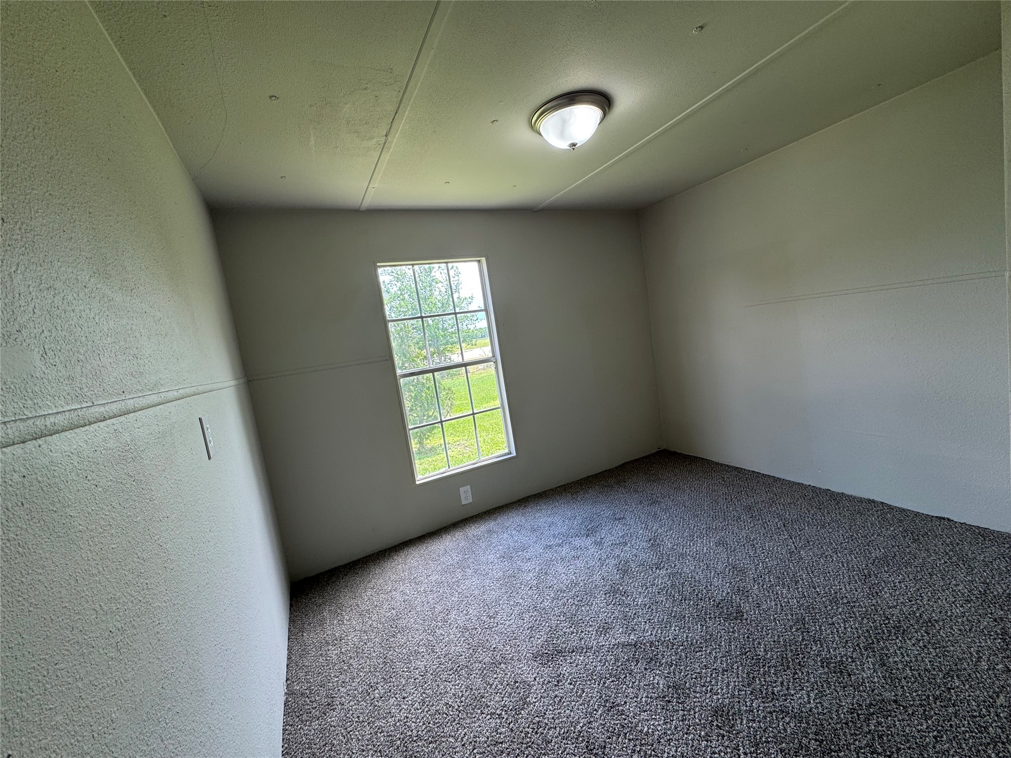 6226 County Road 48 Rosharon, TX 77583 - Photo 7 of 11 an empty room with a window