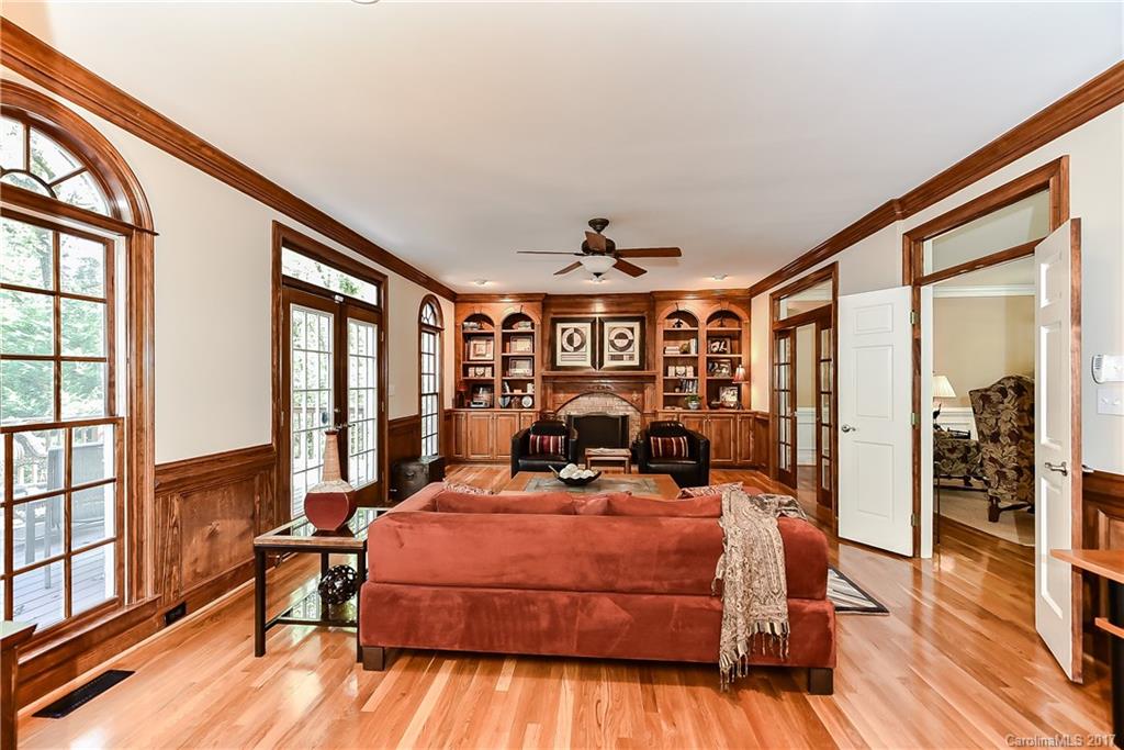 1621 Windy Ridge Road Charlotte, NC 28270 - Photo 7 of 24 a bed room with a bed and a large window