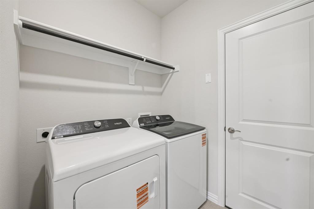 1720 Arches Road Anna, TX 75409 - Photo 16 of 31 a utility room with dryer and washer