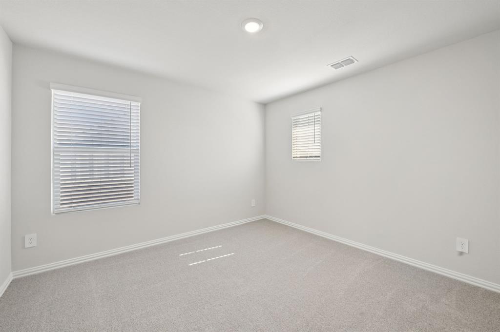 1720 Arches Road Anna, TX 75409 - Photo 24 of 31 an empty room with a window