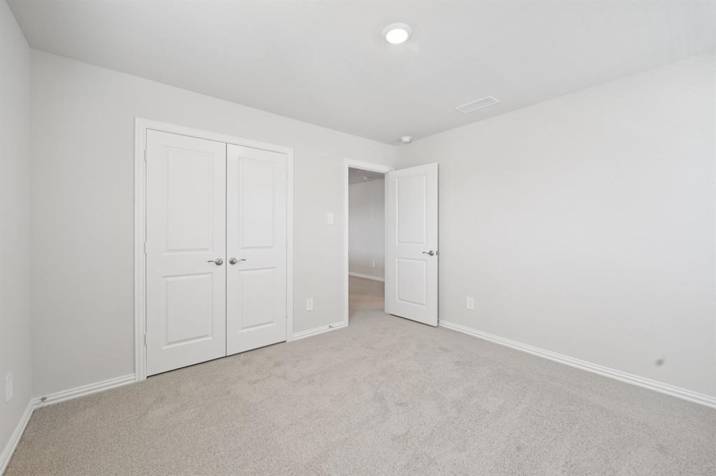 1720 Arches Road Anna, TX 75409 - Photo 25 of 31 a view of an empty room