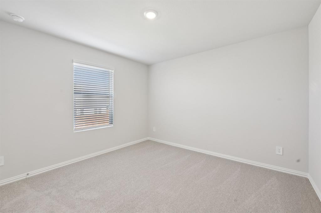 1720 Arches Road Anna, TX 75409 - Photo 27 of 31 an empty room with a window
