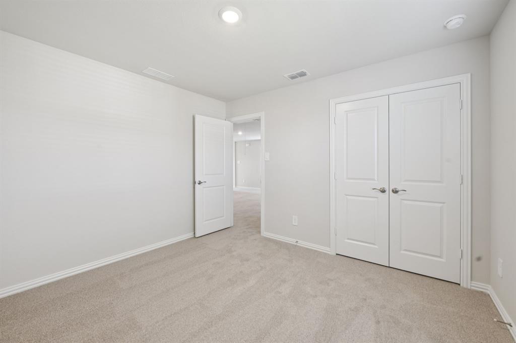 1720 Arches Road Anna, TX 75409 - Photo 28 of 31 a view of an empty room