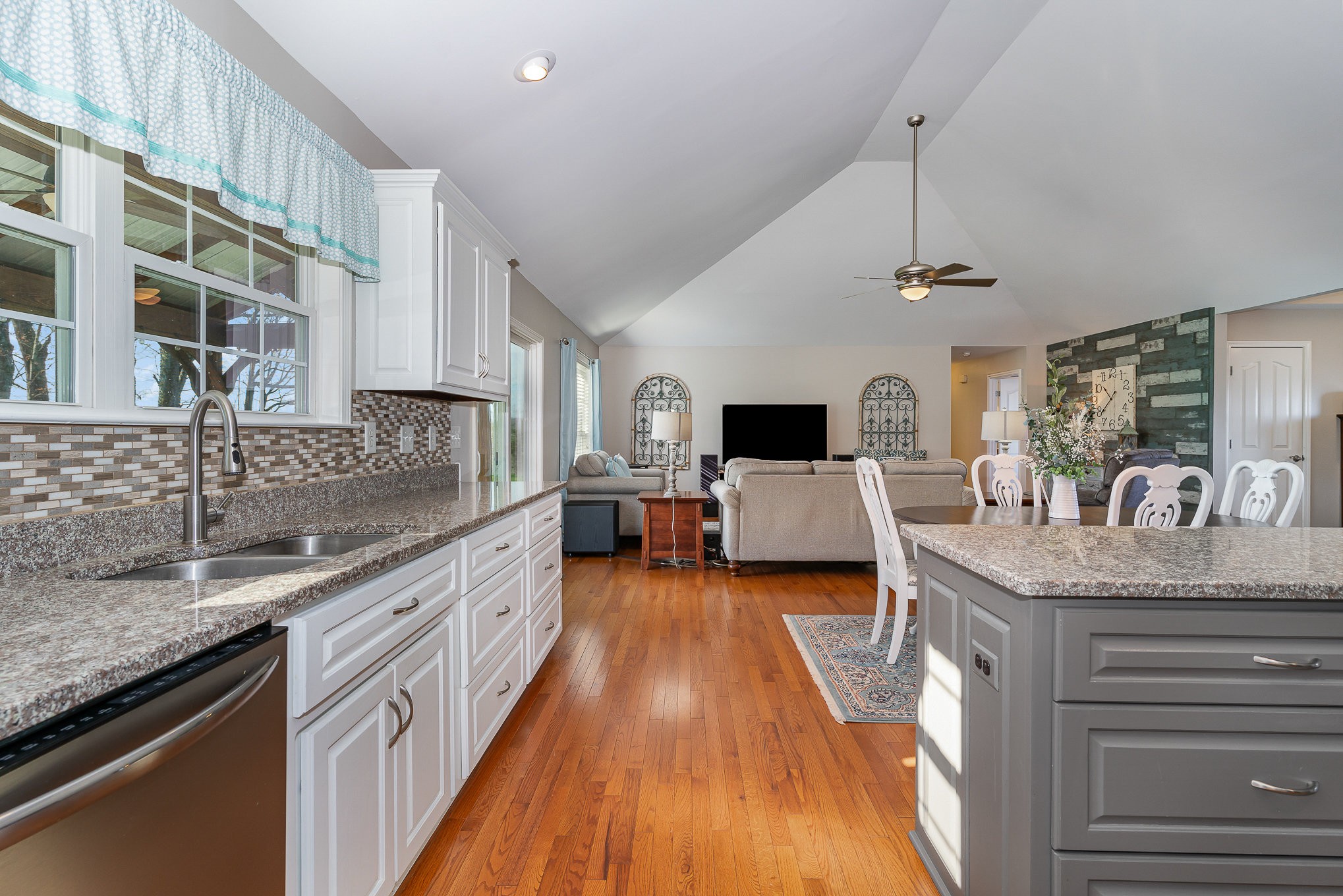 1525 Heller Ridge Spring Hill, TN 37174 - Photo 13 of 57 a kitchen with stainless steel appliances granite countertop a sink and stove