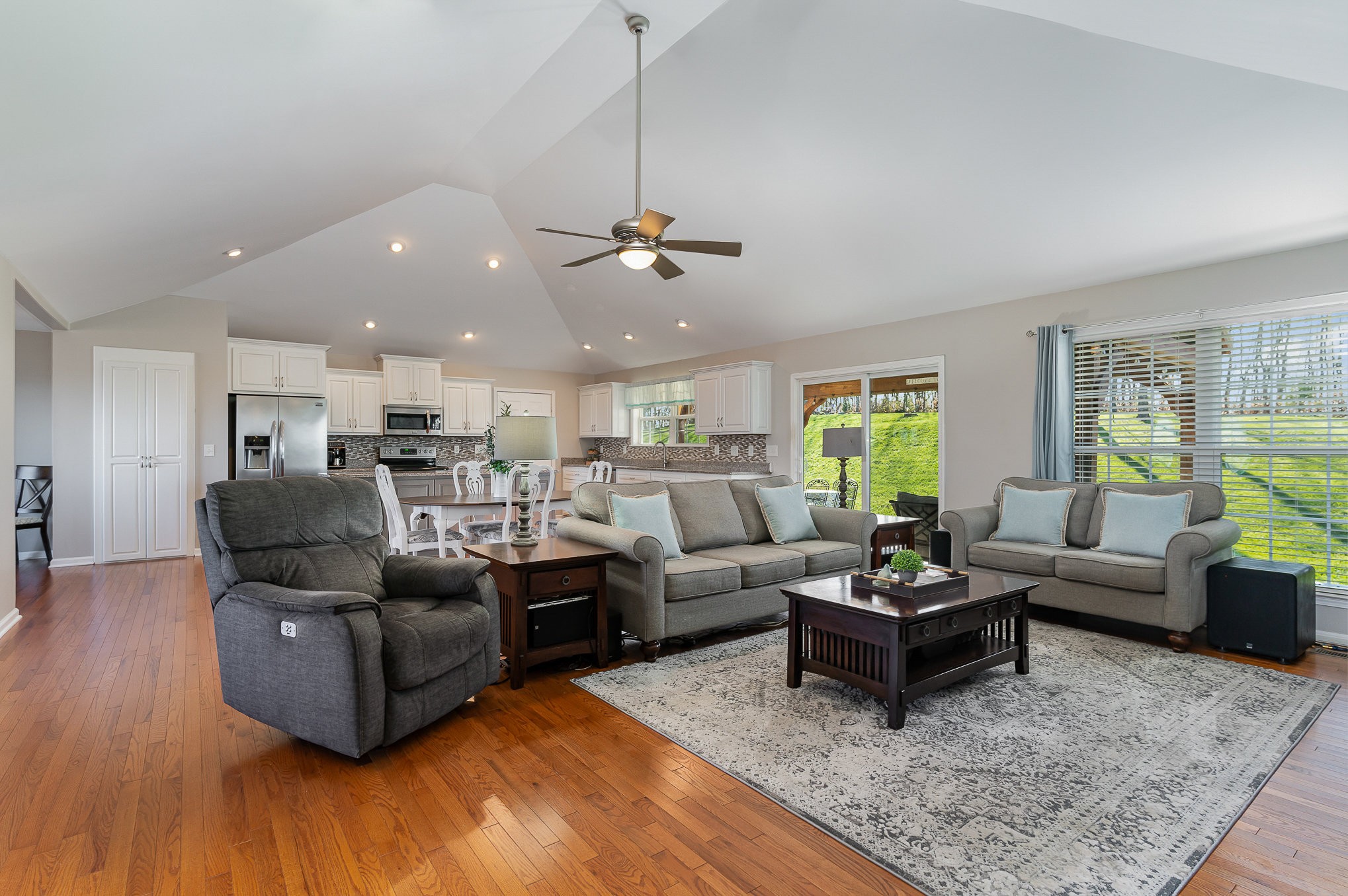 1525 Heller Ridge Spring Hill, TN 37174 - Photo 16 of 57 a living room with lots of furniture and a wooden floor