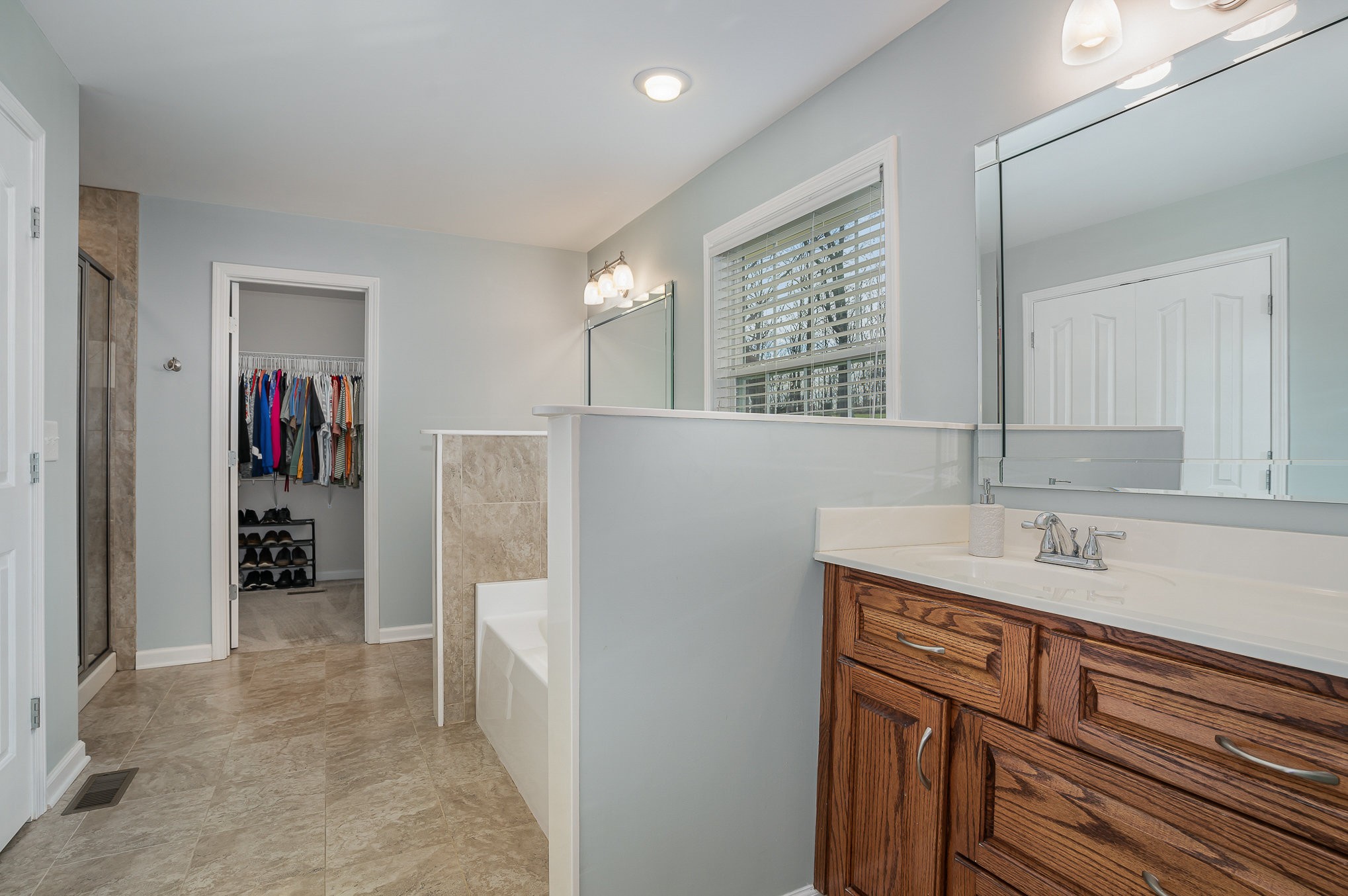 1525 Heller Ridge Spring Hill, TN 37174 - Photo 20 of 57 a bathroom with a sink and a mirror