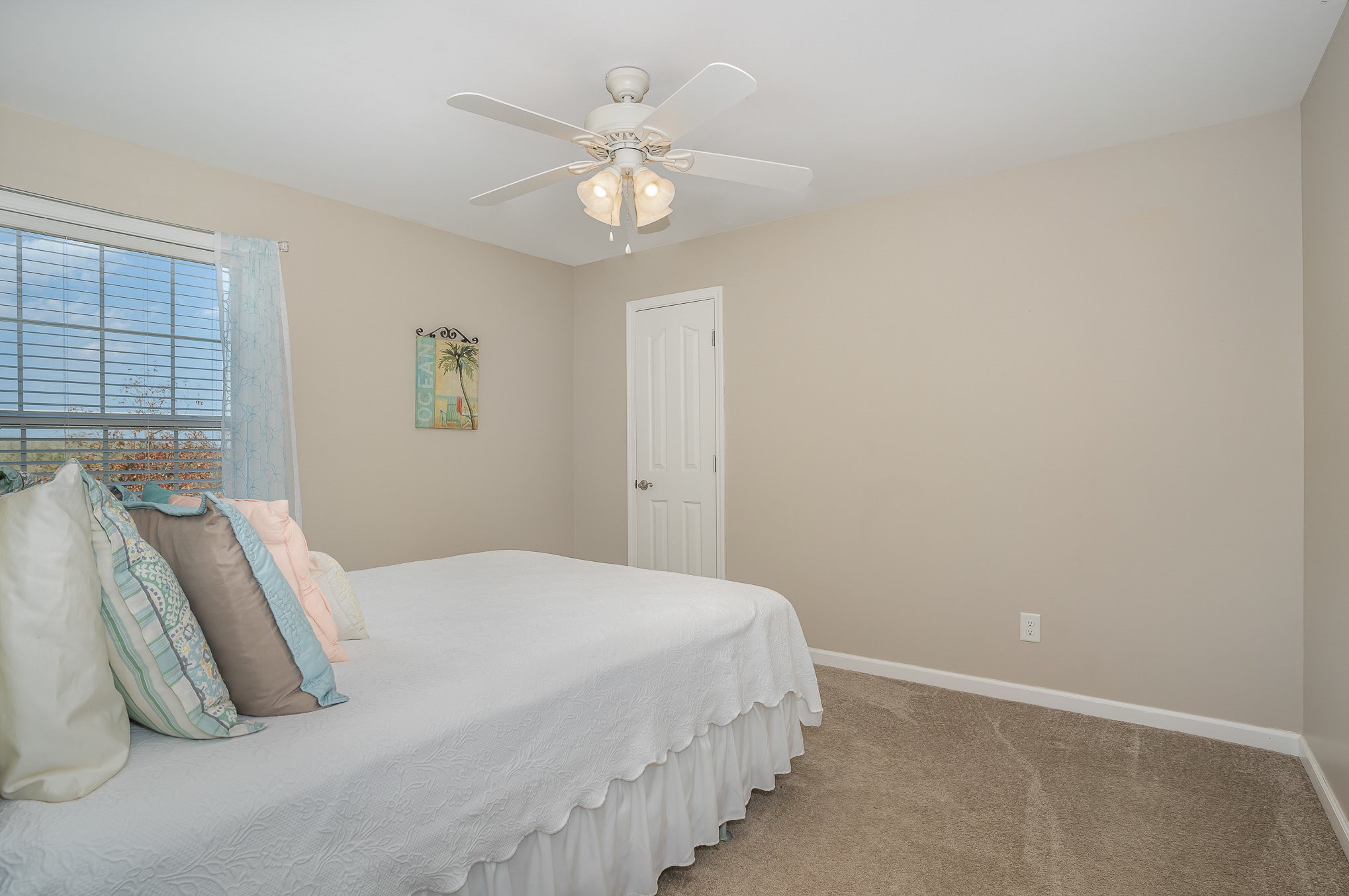 1525 Heller Ridge Spring Hill, TN 37174 - Photo 22 of 57 a bedroom with a bed and a chandelier