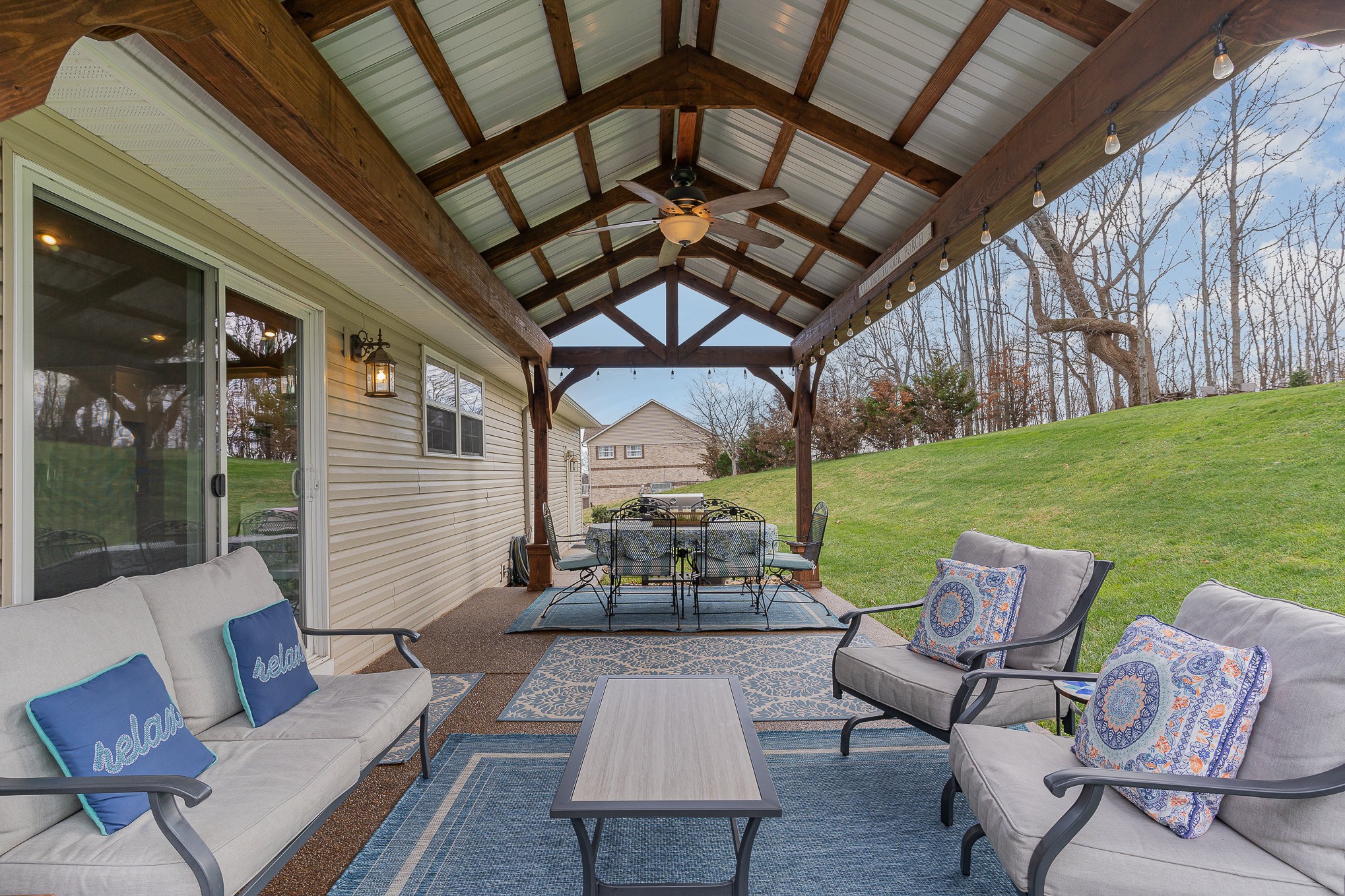 1525 Heller Ridge Spring Hill, TN 37174 - Photo 30 of 57 a outdoor space with patio lots of furniture and garden view