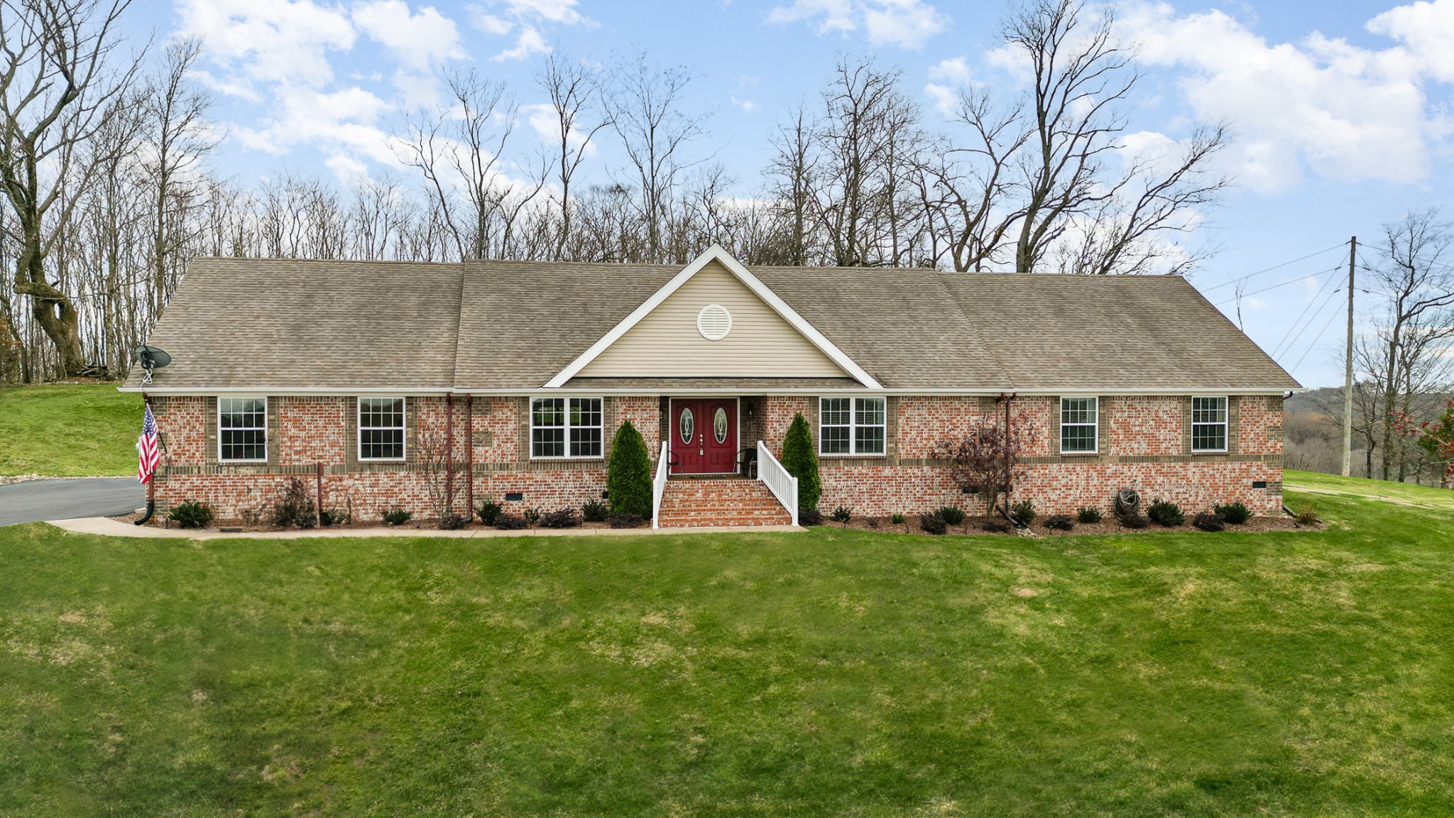 1525 Heller Ridge Spring Hill, TN 37174 - Photo 3 of 57 a view of a house with a big yard and large trees
