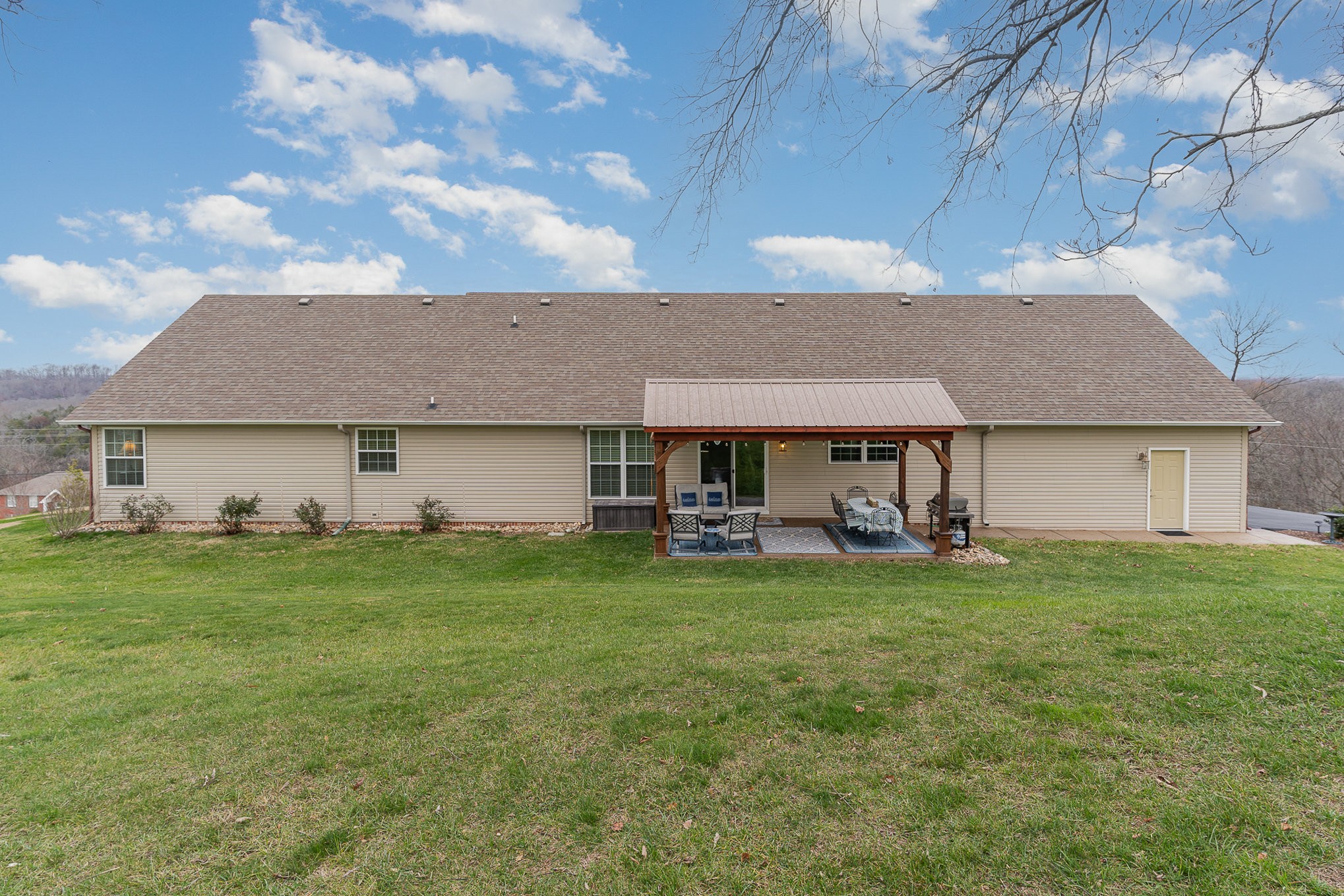 1525 Heller Ridge Spring Hill, TN 37174 - Photo 34 of 57 a front view of house with yard barbeque and outdoor seating