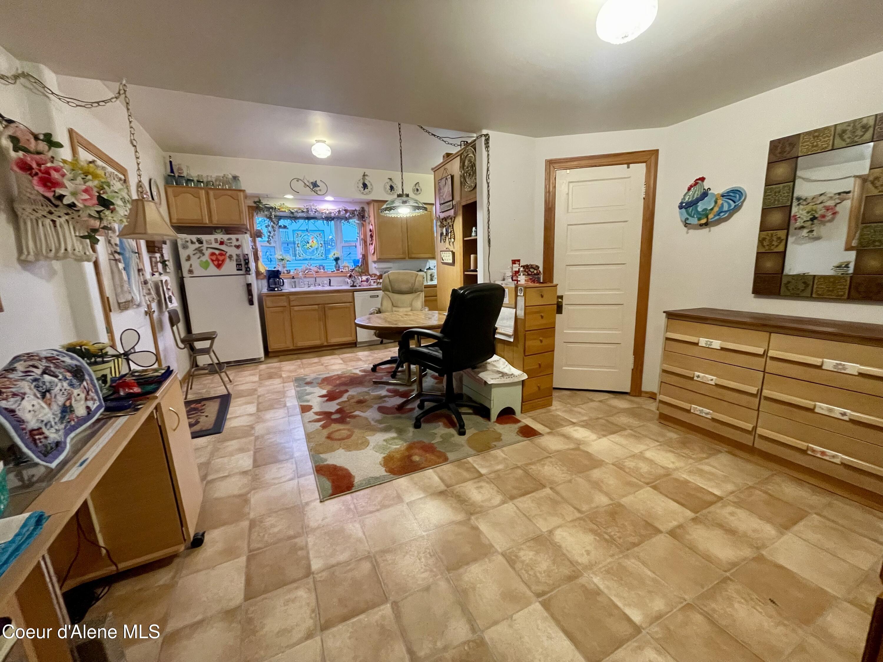 125 Sunset View Street St. Maries, ID 83861 - Photo 9 of 54 Upper Unit Sewing Room/Kitchen