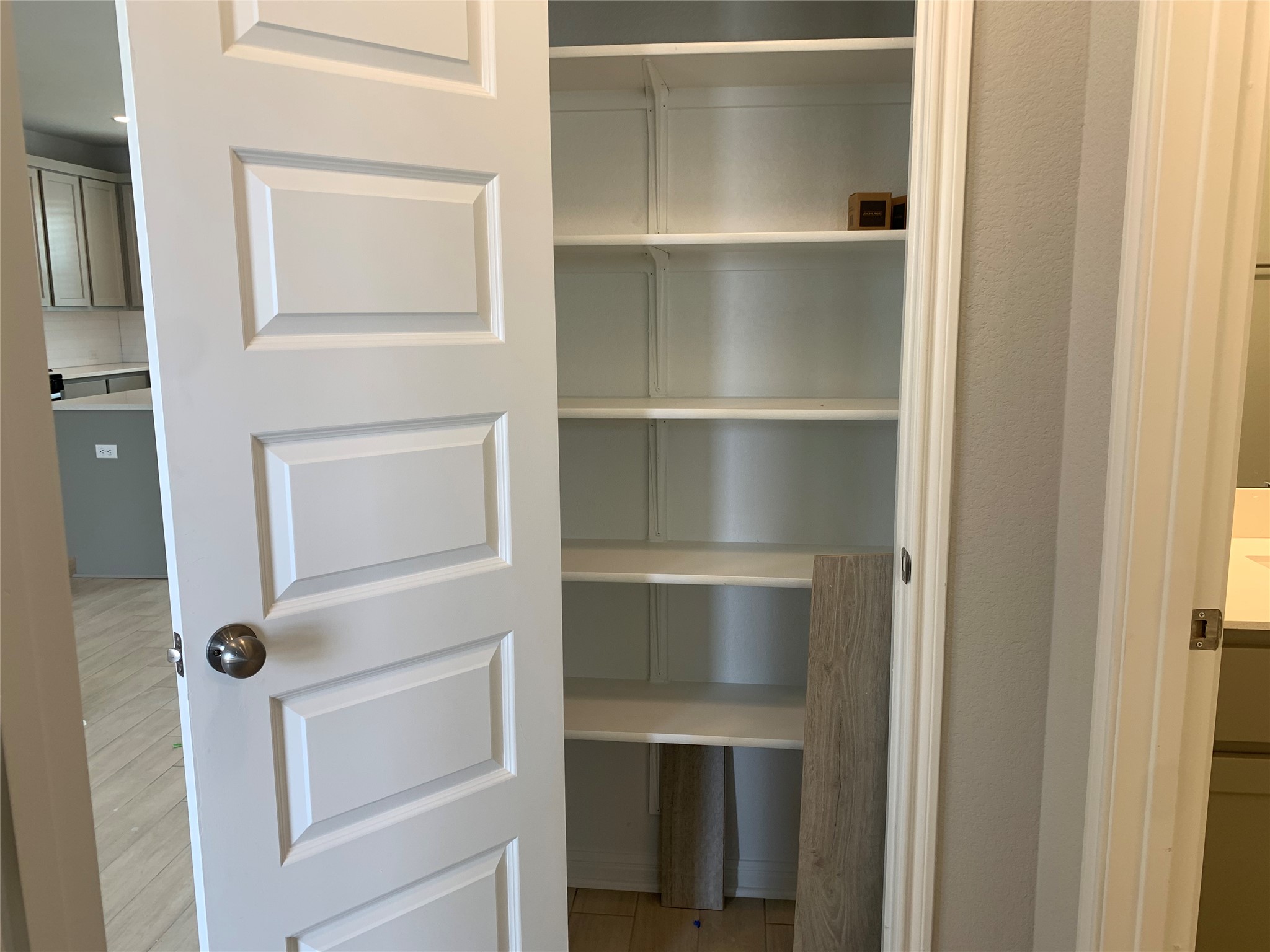 2948 Sage Ranch Drive Leander, TX 78641 - Photo 8 of 28 Functional pantry storage, conveniently located near the kitchen, offers effortless organization.