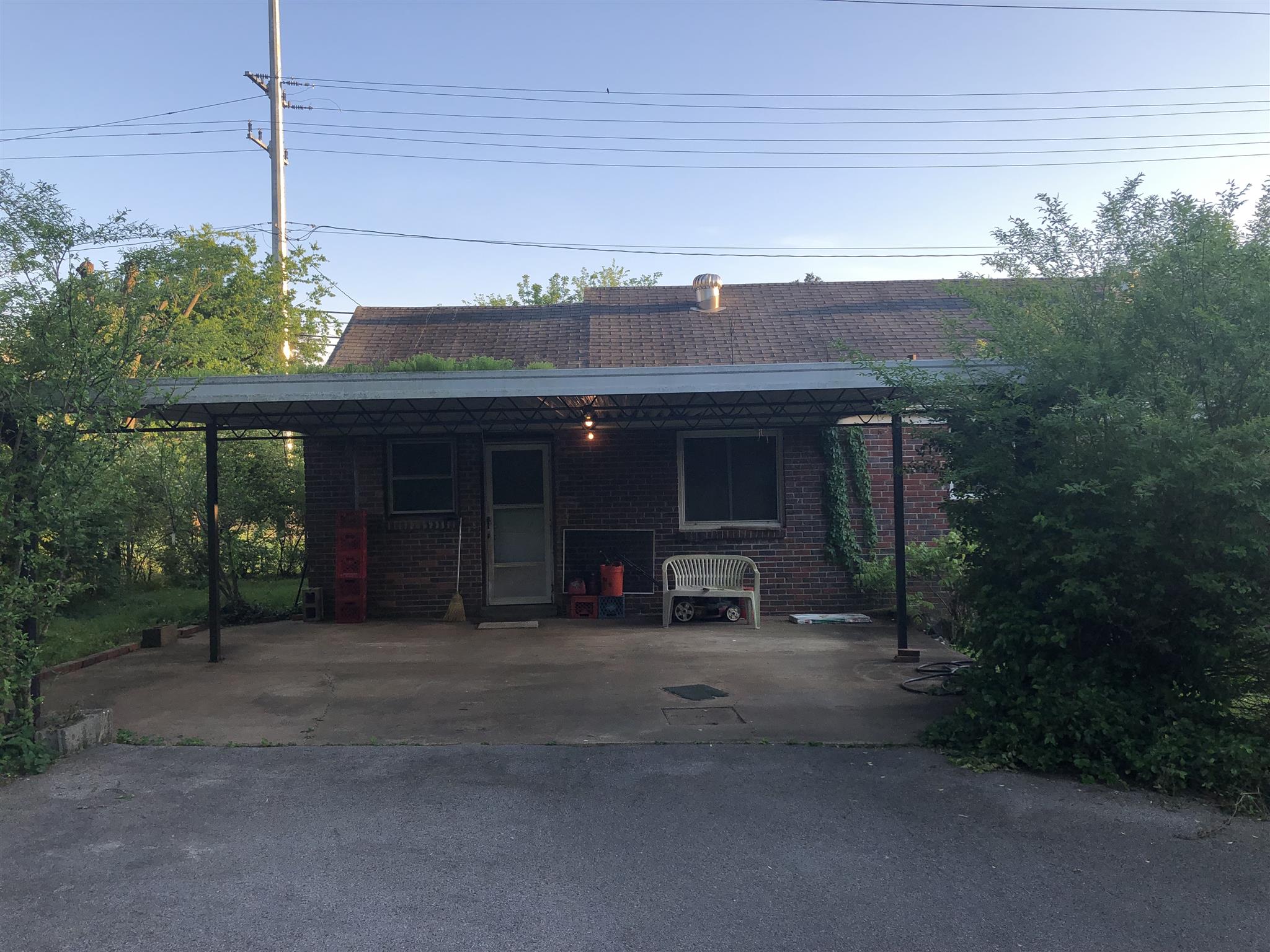 637 Neelys Bend Road Madison, TN 37115 - Photo 14 of 15 a front view of a house with a sitting area