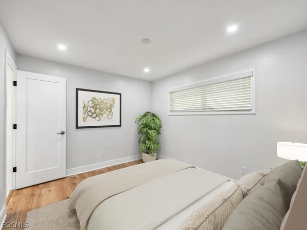 a utility room with multiple dryer and washer