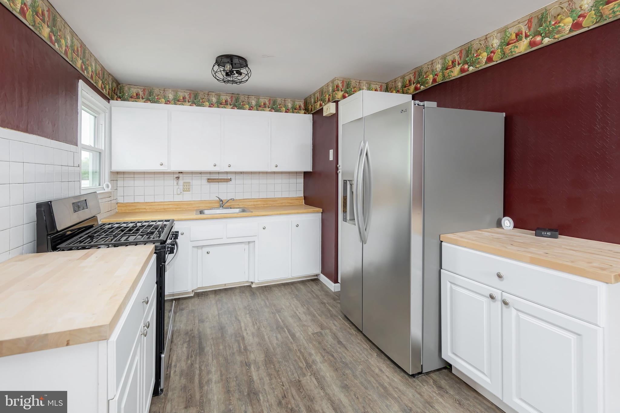 1510 Good Intent Road Deptford, NJ 08096 - Photo 10 of 20 a kitchen with a refrigerator and a sink