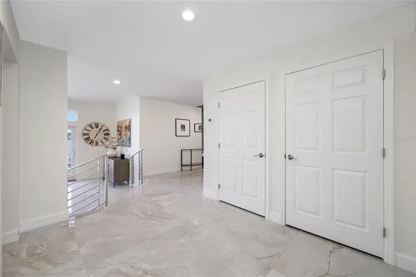 a kitchen with stainless steel appliances granite countertop a sink and stove top oven