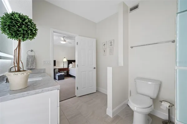 a view of a swimming pool with a lounge chair