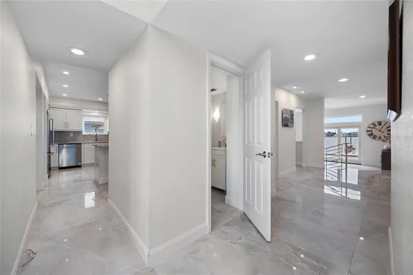 a view of a swimming pool with a lounge chair