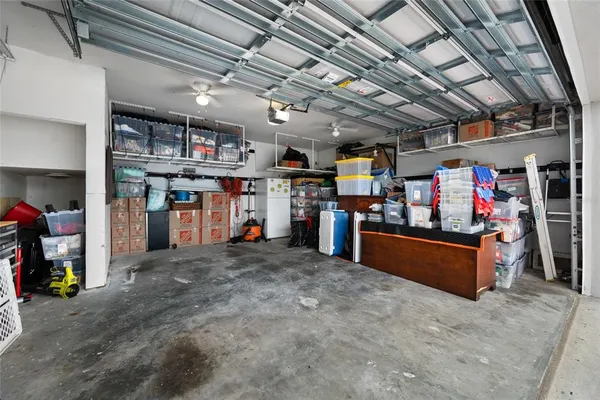 an aerial view of a houses with an outdoor space