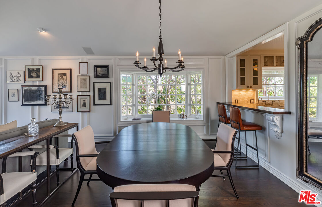 1612 Gilcrest Drive Beverly Hills, CA 90210 - Photo 9 of 33 a view of a dining room with furniture window and wooden floor