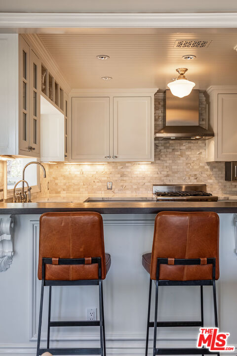 1612 Gilcrest Drive Beverly Hills, CA 90210 - Photo 10 of 33 a kitchen with a sink cabinets and window
