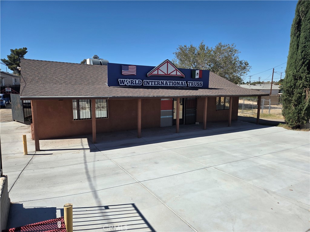 14258 Hesperia Road Victorville, CA 92395 - Photo 6 of 6 a view of a house with a outdoor space