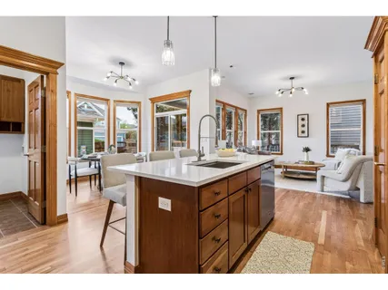 a open kitchen with stainless steel appliances granite countertop a stove and cabinets