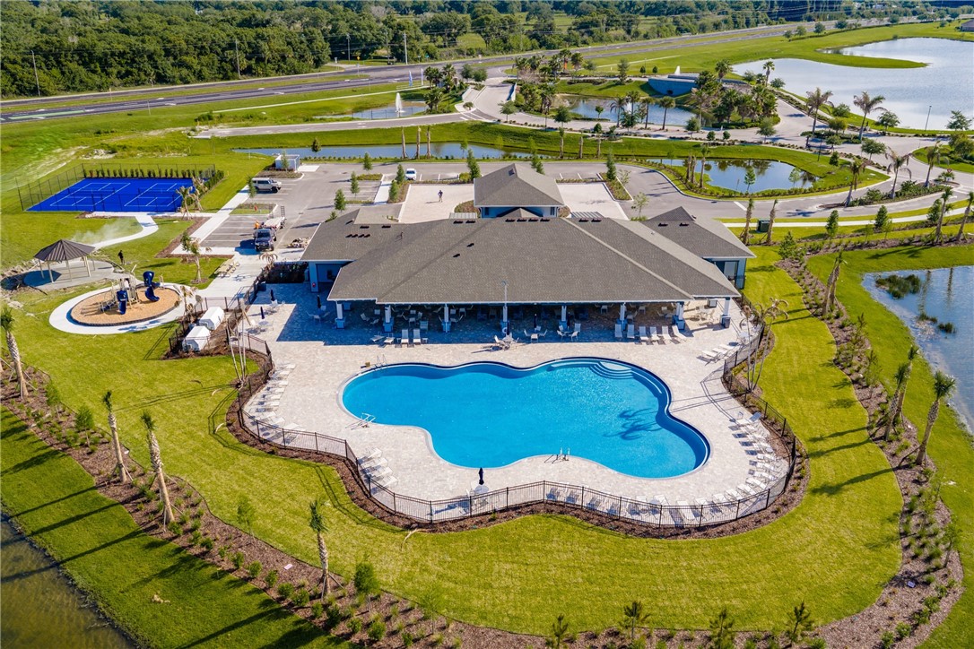 3453 Trinity Circle Fort Pierce, FL 34945 - Photo 26 of 36 a view of swimming pool with outdoor seating