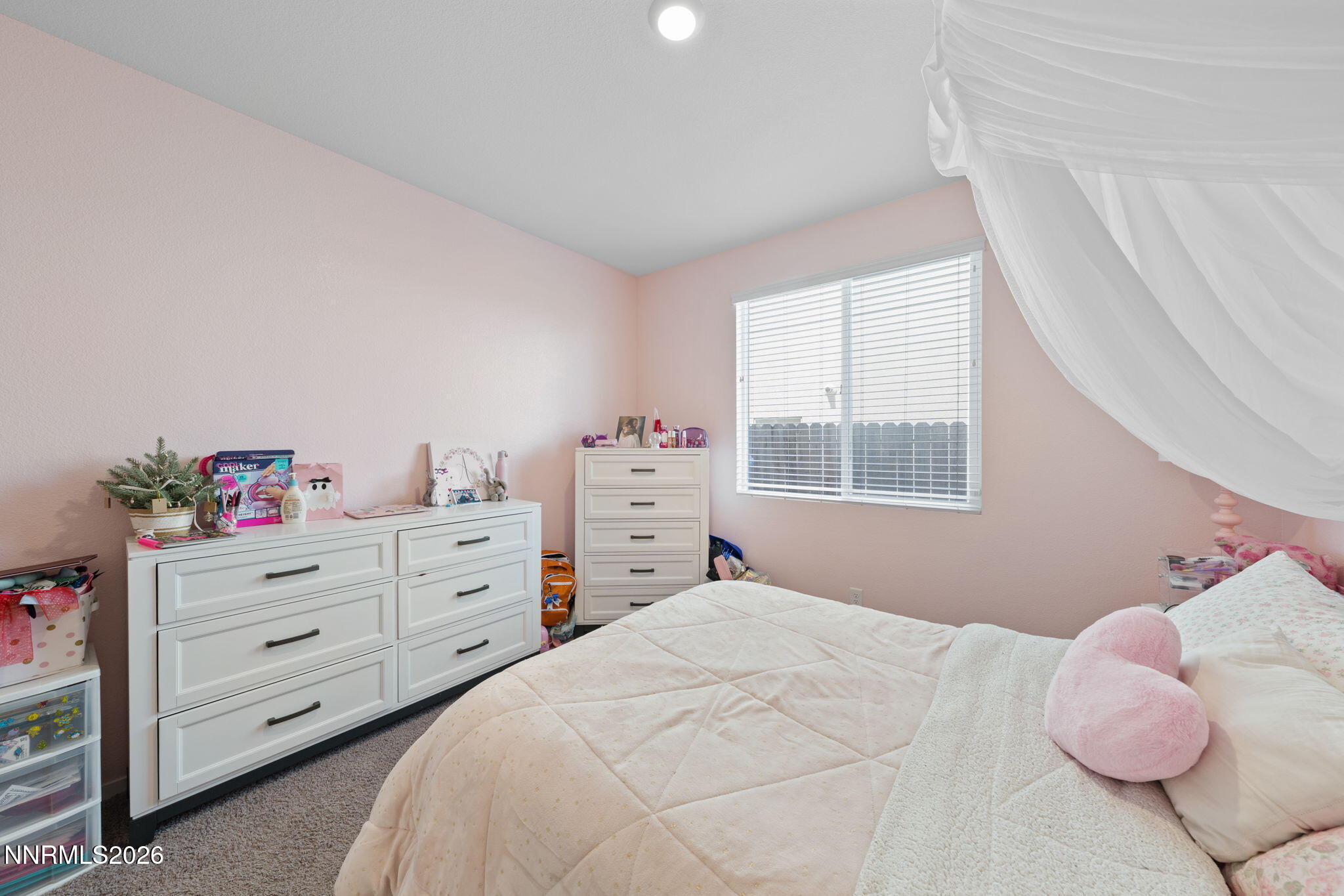 9708 Sea Glass Drive Reno, NV 89506 - Photo 15 of 51 a bedroom with a bed and a window