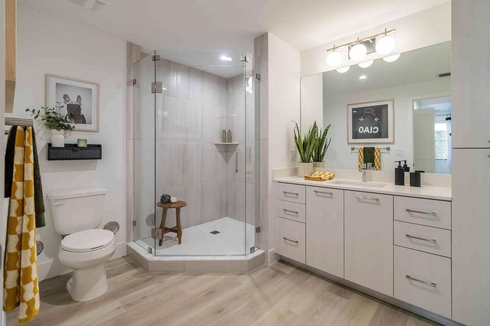 12245 Southwest 30th Street, Unit 101 Miramar, FL 33025 - Photo 5 of 16 a bathroom with a sink a toilet and shower