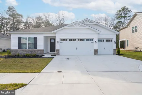 a view of house with outdoor space