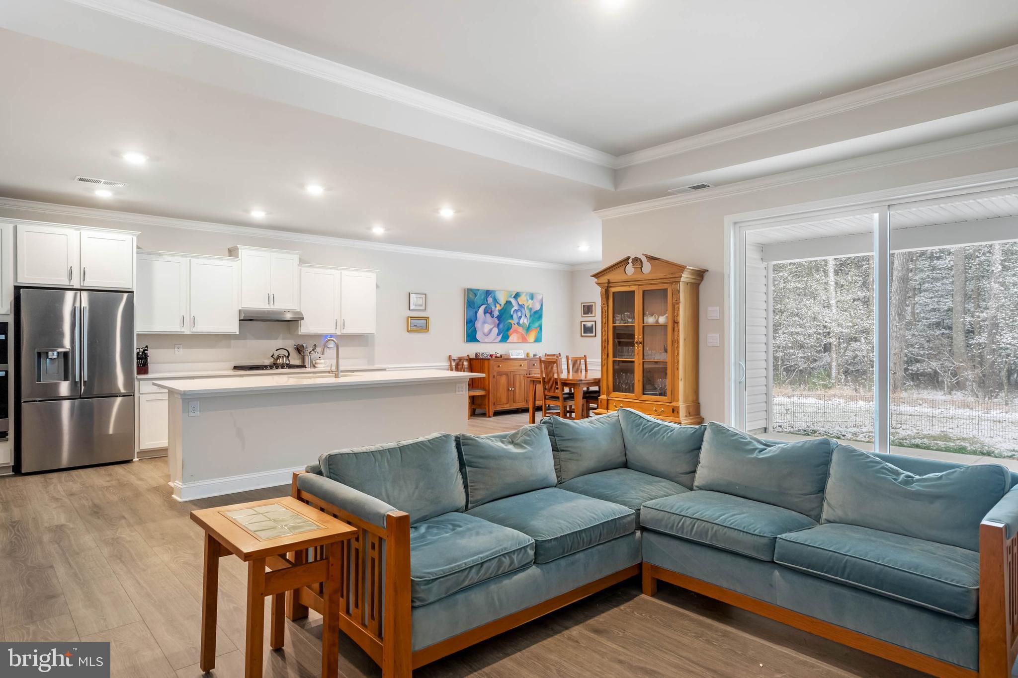 34084 Skyflower Loop Lewes, DE 19958 - Photo 26 of 50 a living room with furniture and a large window