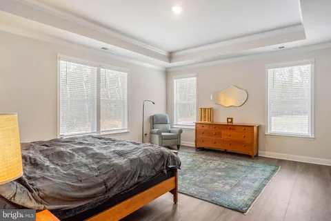 a bed room with a bed and a window