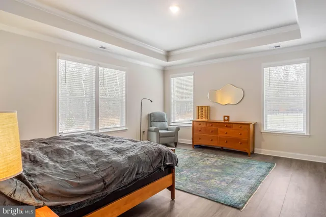 a bed room with a bed and a window