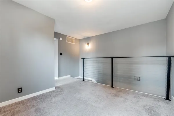 a view of a garage of wooden wall
