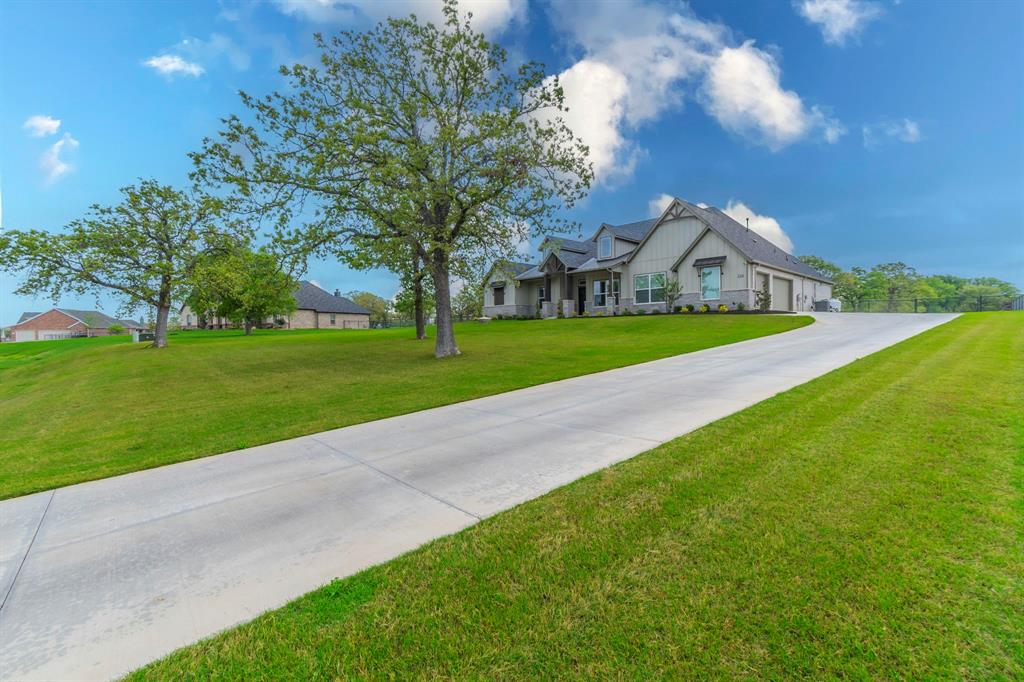 150 Las Brisas Drive Decatur, TX 76234 - Photo 2 of 32 View of front facade with covered porch