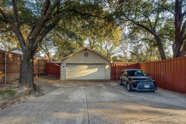 a car parked in front of a house