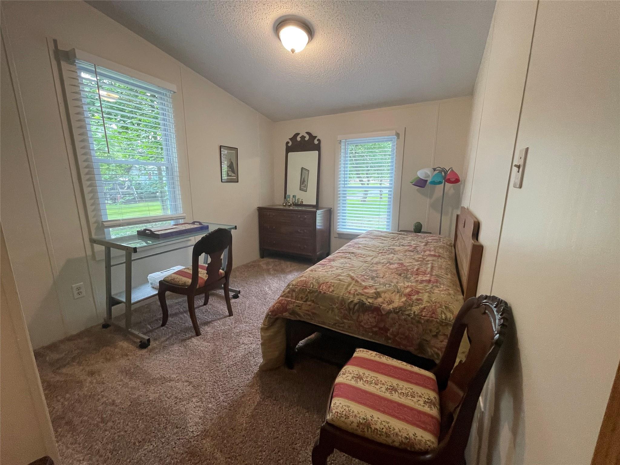 4261 State Rt 17B Callicoon, NY 12723 - Photo 26 of 37 a bedroom with furniture and a window