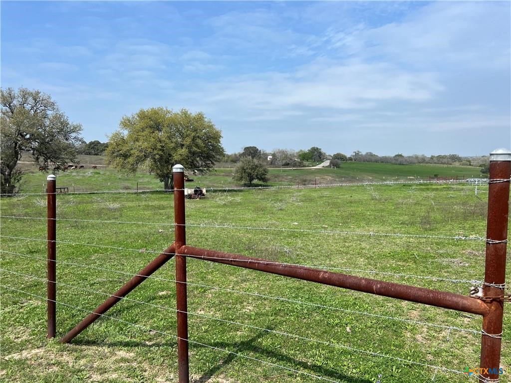 847 Hefner Lane Cuero, TX 77954 - Photo 12 of 48 a view of lake from balcony with outdoor space