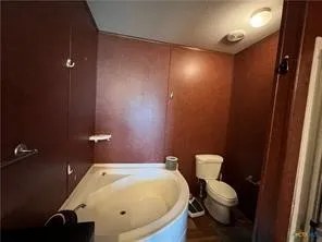a bathroom with a sink and a toilet