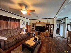 847 Hefner Lane Cuero, TX 77954 - Photo 32 of 48 a living room with furniture and a flat screen tv