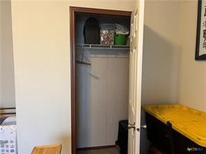 a view of a bedroom from a hallway