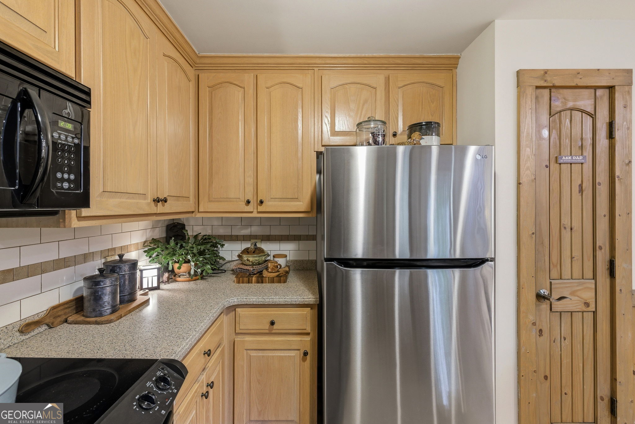 634 Little Hawk Road Sautee Nacoochee, GA 30571 - Photo 14 of 54 a kitchen with stainless steel appliances granite countertop a refrigerator and a sink