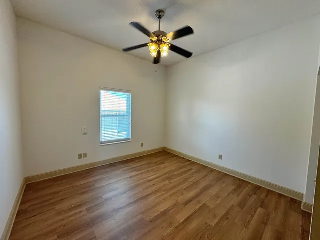 a view of an empty room with window