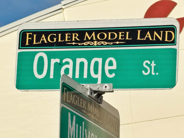 a street sign that is on a pole