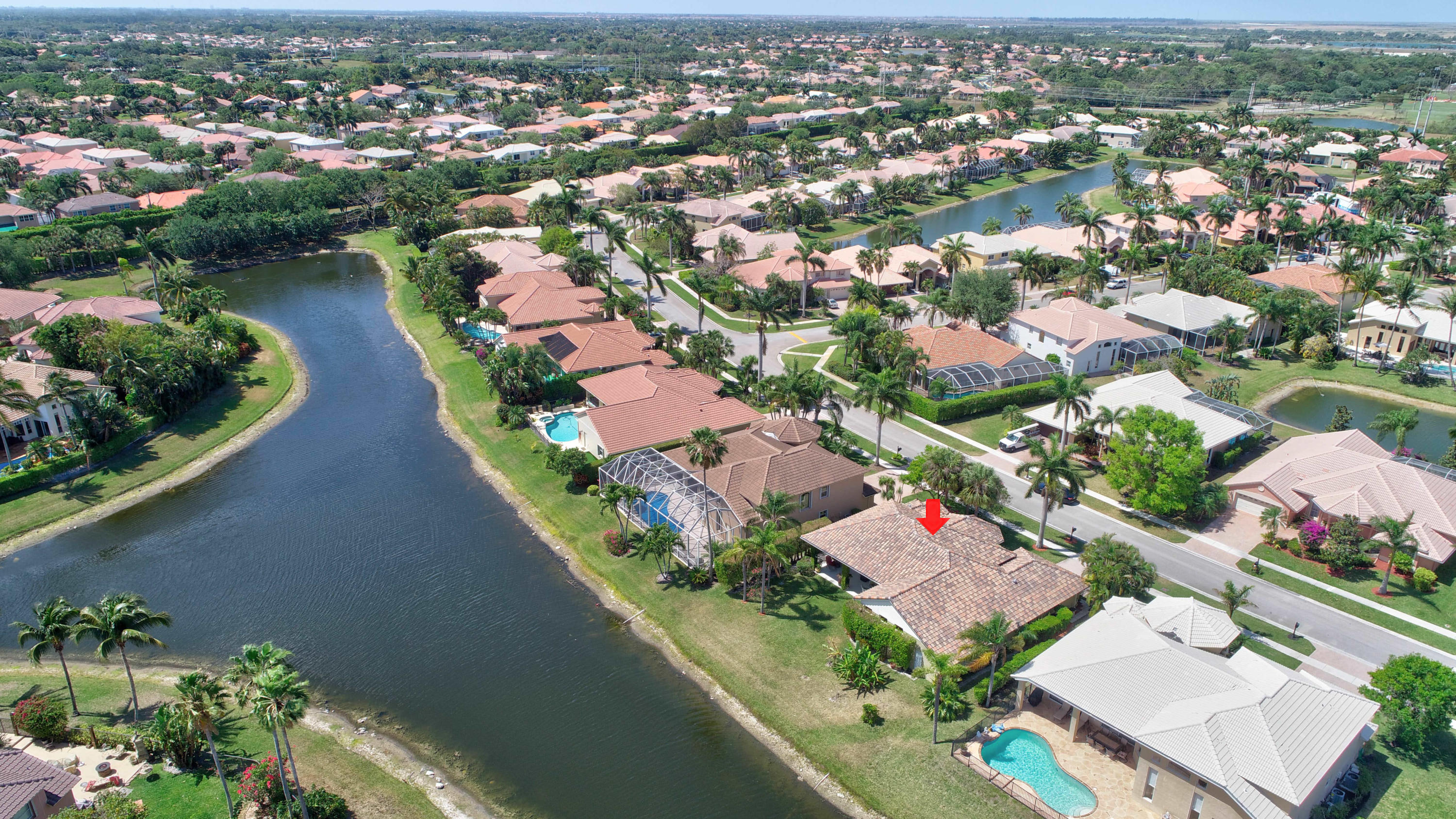 20046 Ocean Key Drive Boca Raton, FL 33498 - Photo 54 of 68 an aerial view of lake and residential houses with outdoor space