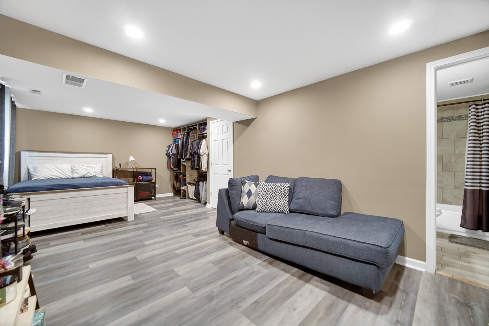 609 West Romeo Road Romeoville, IL 60446 - Photo 16 of 23 a living room with furniture and a wooden floor