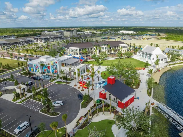 a view of swimming pool with outdoor seating