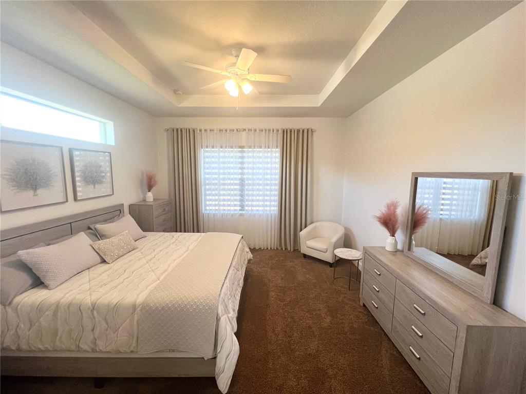 8224 Leopold Avenue North Port, FL 34287 - Photo 5 of 24 a bedroom with a bed and wooden floor