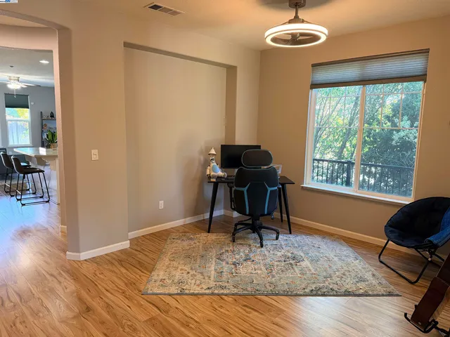 a bathroom with a glass shower door and a shower